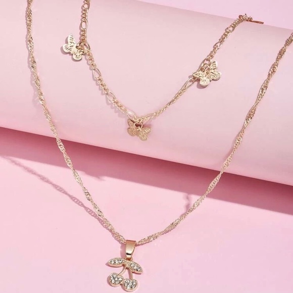 Download Urban Outfitters Jewelry 33 Cherry Butterfly Charm Layered Necklace Poshmark